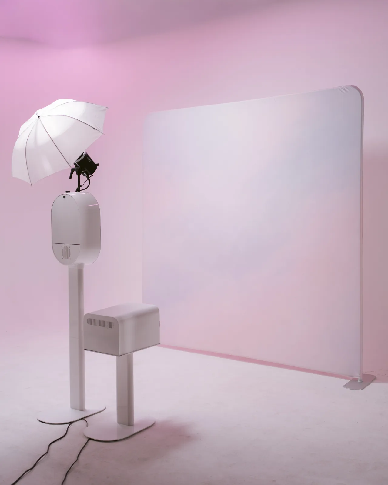 The booth in front of a pastel premium backdrop